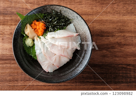 Mackerel Sashimi Served on a Black Bowl. 123098982