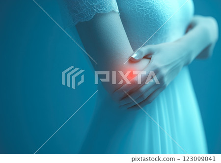 A 3D model of an elbow joint is shown, highlighting areas of pain and inflammation with bright red and orange colors. Generative AI. A 3D model of an elbow joint is shown, highlighting areas of pain and inflammation with bright red and orange colors. Generative AI. 123099041