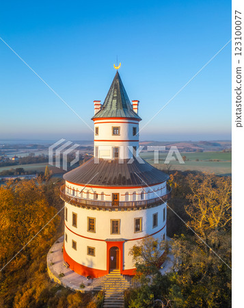 The Baroque Humprecht chateau stands proudly above Sobotka during an autumn sunrise, highlighting its elliptical design and scenic landscape of the Bohemian Paradise in Czechia. The Baroque Humprecht chateau stands proudly above Sobotka during an autumn sunrise, highlighting its elliptical design and scenic landscape of the Bohemian Paradise in Czechia. 123100077