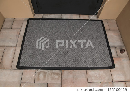 Door Mat Entryway Outdoor Mat Welcome Mats Entry Grey Mat. Brown floor tiles. Top View 123100429