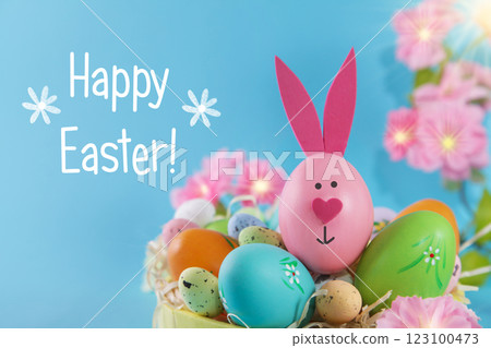 Easter egg Bunny on blue background. DIY decoration Easter. Craft concept 123100473