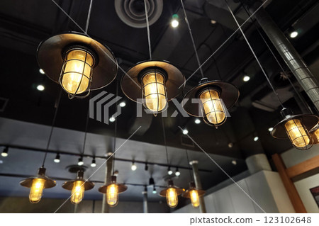 Vintage Lamps hanging on the Cafe Ceiling. 123102648