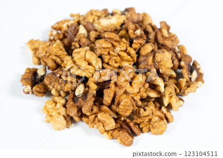 Shelled walnuts on a white background close-up Shelled walnuts on a white background close-up 123104511