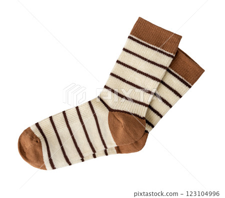 Pair of beige brown striped socks isolated on a white background. Pair of beige brown striped socks isolated on a white background. 123104996