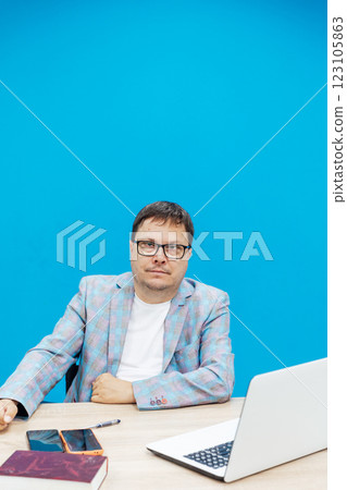Happy business project manager working from home, using laptop, typing, making video call, looking at screen. Happy business project manager working from home, using laptop, typing, making video call, looking at screen. 123105863