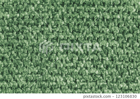 Texture of green jacquard fabric of rough weave structure close up, macro, background Texture of green jacquard fabric of rough weave structure close up, macro, background 123106830