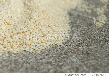 Raw white sesame seeds natural texture Raw white sesame seeds natural texture 123107669