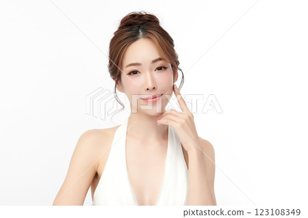 Beautiful young asian woman with clean fresh skin on white background, Face care, Facial treatment, Cosmetology, beauty and spa, Asian women portrait. Beautiful young asian woman with clean fresh skin on white background, Face care, Facial treatment, Cosmetology, beauty and spa, Asian women portrait. 123108349