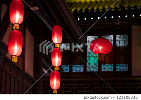 Traditional Chinese Lanterns in a Courtyard at Night Traditional Chinese Lanterns in a Courtyard at Night 123109330