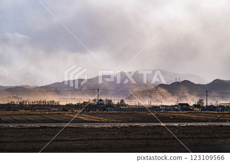 Field soil blown up by strong winds Field soil blown up by strong winds 123109566