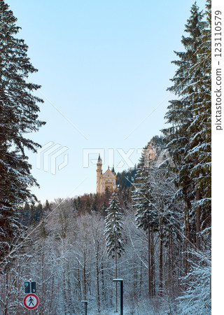 Majestic Neuschwanstein Castle in Snow-Covered Bavarian Alps during Winter Sunrise Majestic Neuschwanstein Castle in Snow-Covered Bavarian Alps during Winter Sunrise 123110579