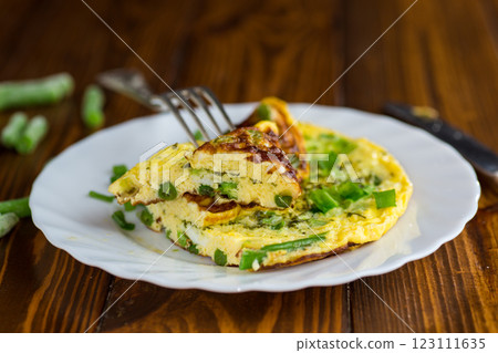 Omelette with beans and fresh herbs Omelette with beans and fresh herbs 123111635