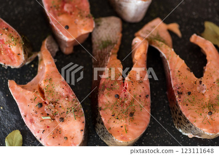 Close-up of fresh salmon steak with spices 123111648