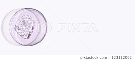 A sample of skin serum or moisturizing gel in a Petri dish. A cosmetic product. Copy space 123112092