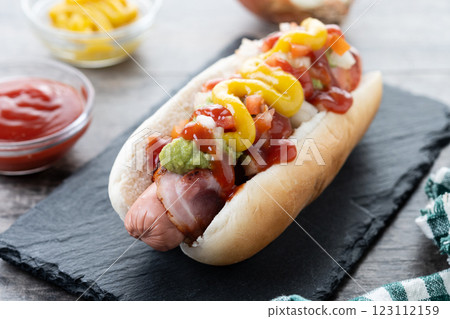 Sonoran hot dog. Traditional Mexican hot dog on wooden table 123112159