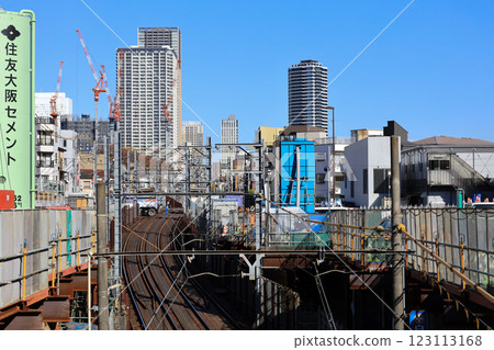 Tracks with Urban Skyline in Vibrant Daylight, Tokyo Dec 6 2024 Tracks with Urban Skyline in Vibrant Daylight, Tokyo Dec 6 2024 123113168