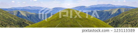 Panorama of green hills in summer mountains Panorama of green hills in summer mountains 123113389