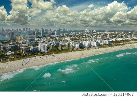 Miami Beach is popular vacation spot in southern Florida. Sandy beach surface and tourist infrastructure 123114062