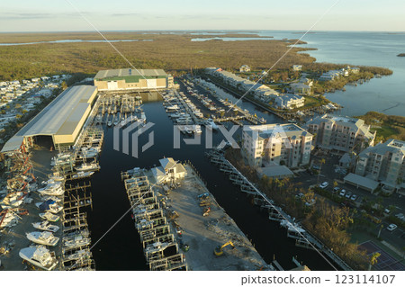 Hurricane Ian destroyed boat station in Florida coastal area. Natural disaster and its consequences 123114107