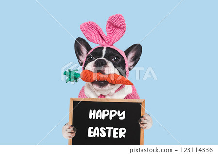 Happy Easter. Cute puppy and congratulatory inscription Happy Easter. Cute puppy and congratulatory inscription 123114336