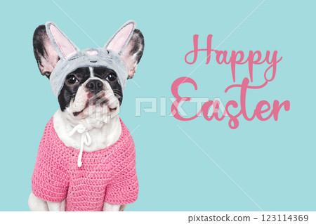 Happy Easter. Cute puppy and congratulatory inscription Happy Easter. Cute puppy and congratulatory inscription 123114369
