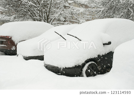 Cars Covered in Heavy Snow After Winter Storm 123114593