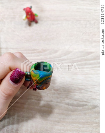 A Colorful Miniature Mug Set Against a Fun and Playful Background for Creative Displays A Colorful Miniature Mug Set Against a Fun and Playful Background for Creative Displays 123114733