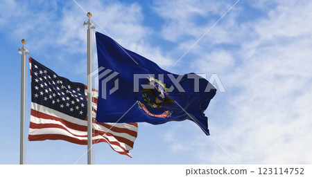 North Dakota state flag waving with the american flag 123114752