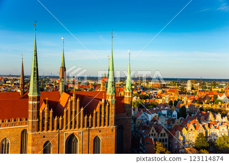 Cityscape aerial view on the old town with saint Marys church on the sunset in Gdansk, Poland Cityscape aerial view on the old town with saint Marys church on the sunset in Gdansk, Poland 123114874