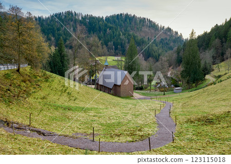 Scenic Countryside Landscape with a Small Brick Chapel and Traditional Houses in a Green Valley of the Black Forest, Germany Scenic Countryside Landscape with a Small Brick Chapel and Traditional Houses in a Green Valley of the Black Forest, Germany 123115018