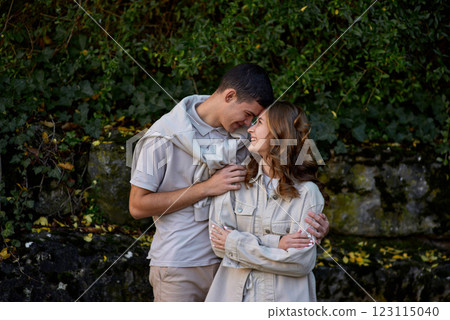 Embracing Teen Love in the Greenery of the Park. 123115040