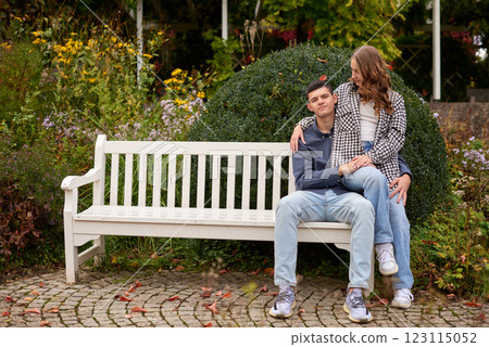 Young Cute Female Hugs Boyfriend. In Autumn Outdoor. Lovers Walking in Park. Attractive Funny Couple. Lovestory in Forest. Man and Woman. Cute Lovers in the Park. Family Concept. Happy Couple. Young Cute Female Hugs Boyfriend. In Autumn Outdoor. Lovers Walking in Park. Attractive Funny Couple. Lovestory in Forest. Man and Woman. Cute Lovers in the Park. Family Concept. Happy Couple. 123115052