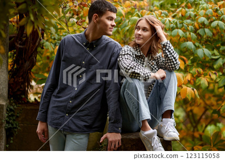 Young Cute Female Hugs Boyfriend. In Autumn Outdoor. Lovers Walking in Park. Attractive Funny Couple. Lovestory in Forest. Man and Woman. Cute Lovers in the Park. Family Concept. Happy Couple. Young Cute Female Hugs Boyfriend. In Autumn Outdoor. Lovers Walking in Park. Attractive Funny Couple. Lovestory in Forest. Man and Woman. Cute Lovers in the Park. Family Concept. Happy Couple. 123115058