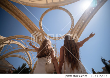 Girls Golden Arch Structure Sunny Day 123115464