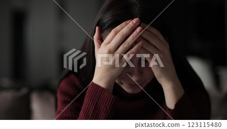 Young woman suffering from depression. Woman hands, fidget and pray, signaling mental battle. Emotional relationship and marriage crisis. 123115480