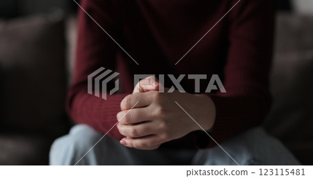 Young woman suffering from depression. Woman hands, fidget and pray, signaling mental battle. Emotional relationship and marriage crisis. Young woman suffering from depression. Woman hands, fidget and pray, signaling mental battle. Emotional relationship and marriage crisis. 123115481