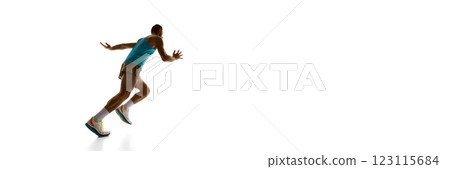 Banner. Sprinter accelerating towards finish, strong stride and engaged muscles displaying full speed against white studio background. Copy space. 123115684