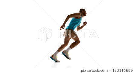 Runner accelerating forward, dynamic posture and strong physique emphasizing movement against white studio background. Runner accelerating forward, dynamic posture and strong physique emphasizing movement against white studio background. 123115699