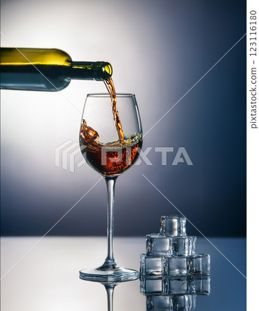 Elegant Pour of Red Wine Close Up 123116180