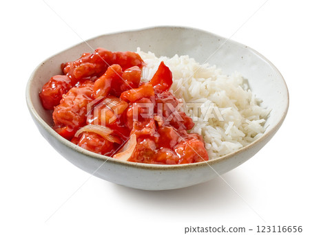 bowl of basmati rice with red sweet and sour chicken sauce 123116656