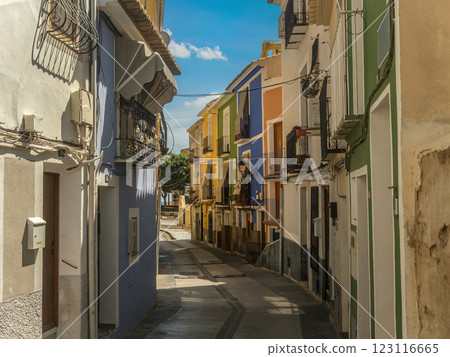 Narrow street with colorful houses in Villajoyosa, Spain 123116665