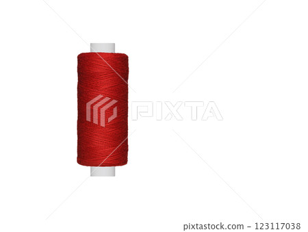 Red spool of sewing thread isolated on white background Red spool of sewing thread isolated on white background 123117038