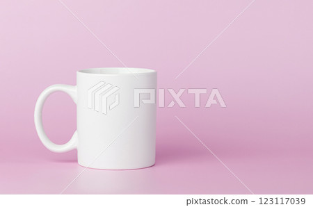 white cup for tea or coffee on a pink background 123117039