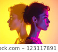 Double exposure visual of a young woman illuminated by red-purple light Double exposure visual of a young woman illuminated by red-purple light 123117891