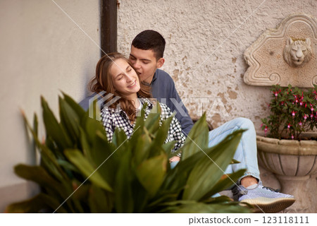 Young Cute Female Hugs Boyfriend. In Autumn Outdoor. Lovers Walking in Park. Attractive Funny Couple. Lovestory in Forest. Man and Woman. Cute Lovers in the Park. Family Concept. Happy Couple. 123118111