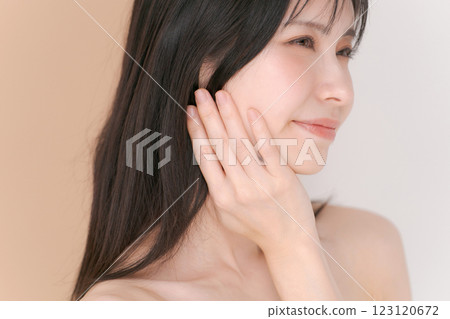 A woman satisfied with her skin care 123120672