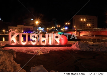 Cool KUSHIRO and Nusamai Bridge lit up with snow (with the flower clock at Nusamai Park in the background) 123121285