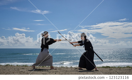 Two samurai facing off on the beach 123123116