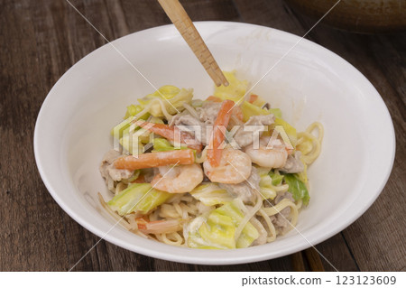 The process of making champon: Put the champon into the bowl The process of making champon: Put the champon into the bowl 123123609
