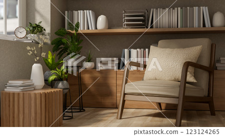 A wooden armchair and a table with decorative items in front of the build in wooden shelf. 123124265